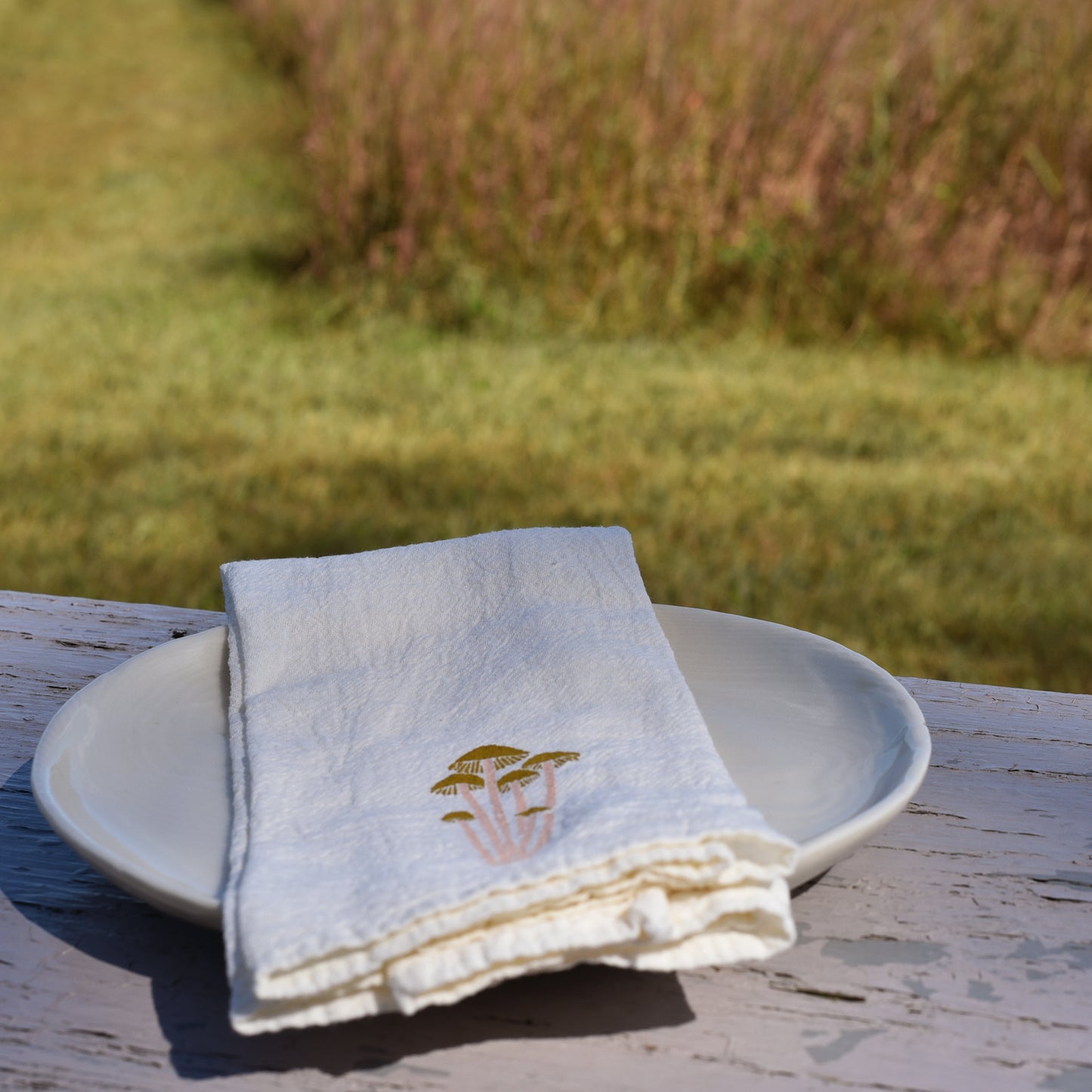 Cloth napkin with Forest Mushroom design for the mushroom forager in you life, designed by katie forte of june & december