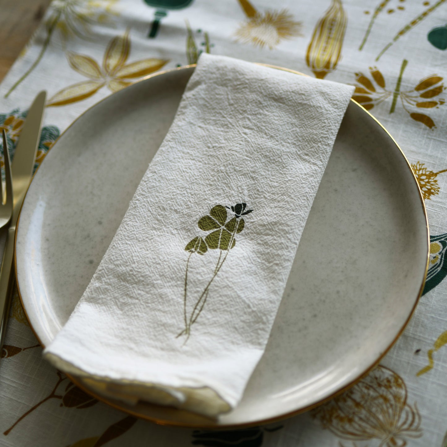 Designer West Elm Table Runner with organic cotton featuring  botanical nature seed pod artwork by June & December artist Katie Forte