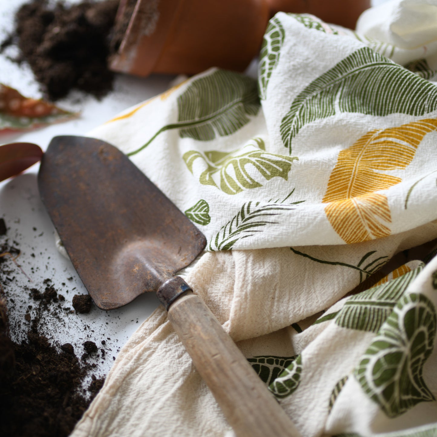 Kitchen tea towel made with eco-friendly flour sack in the usa featuring botanical Garden Green Thumb artwork by june & december artist katie forte