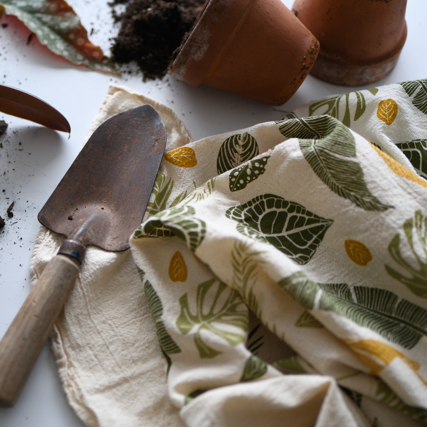Kitchen tea towel made with eco-friendly flour sack in the usa featuring natural botanical green thumb artwork by june & december artist katie forte