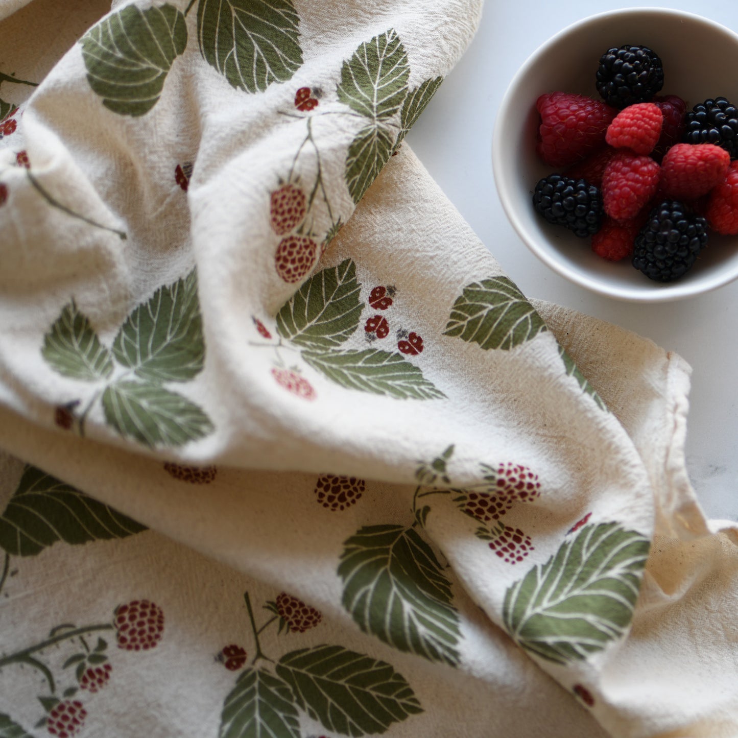 Kitchen tea towel made with eco-friendly flour sack in the usa featuring natural botanical ladybug + bird artwork by june & december artist katie forte