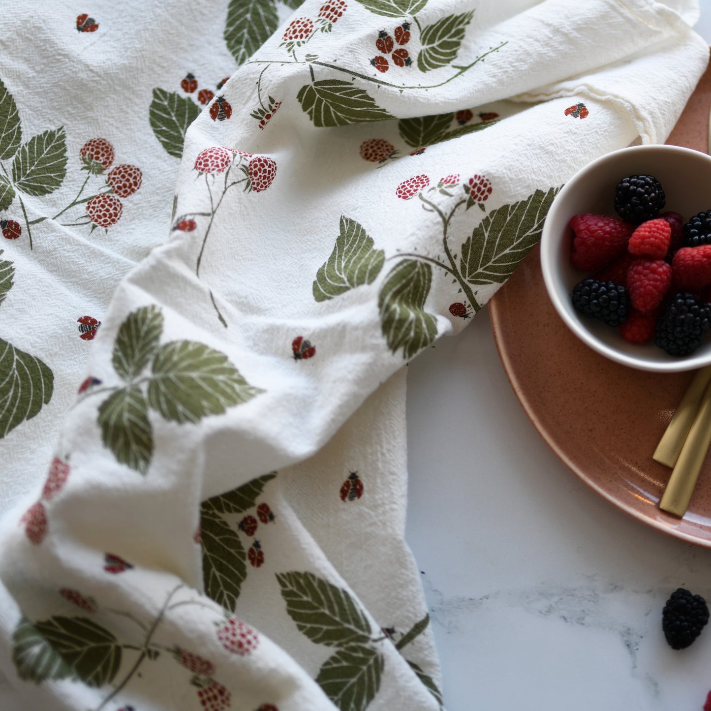 Kitchen tea towel made with eco-friendly flour sack in the usa featuring botanical ladybug + bird artwork by june & december artist katie forte