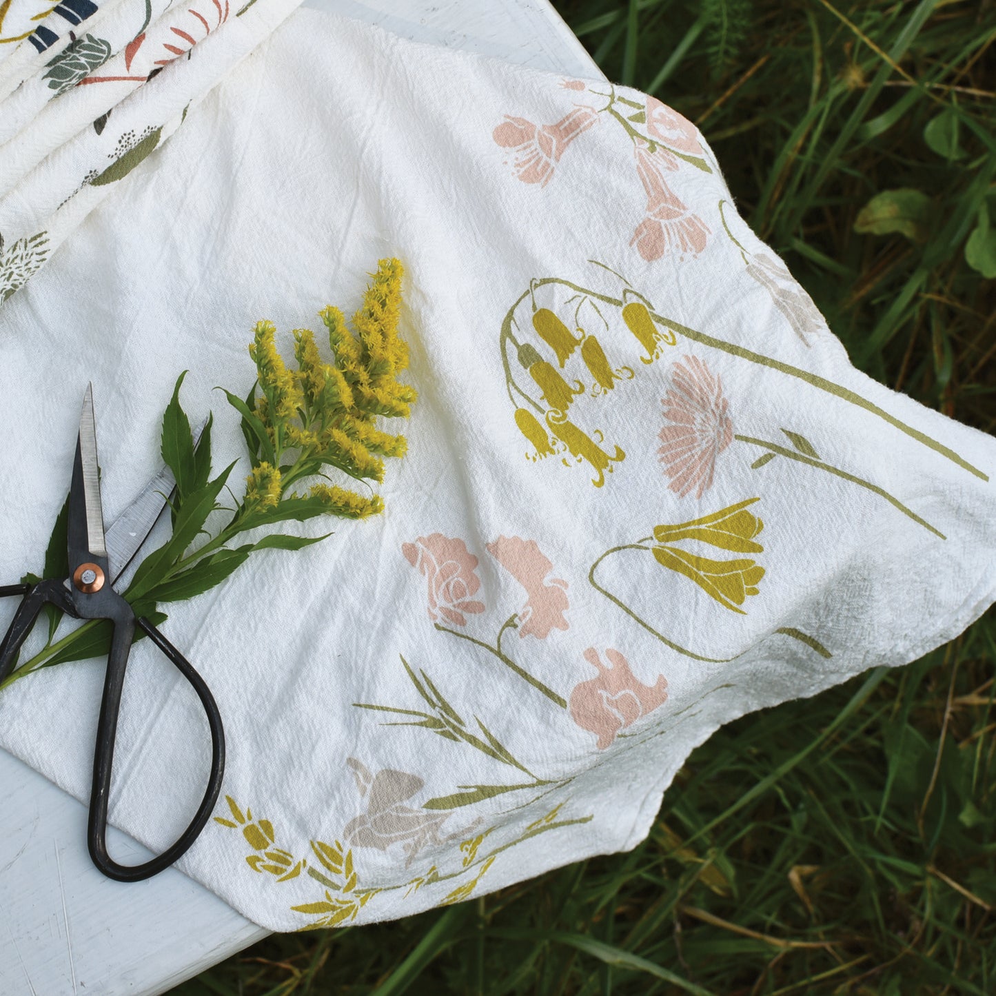 Kitchen tea towel speaking Gratitude, the language of a flower, designed by Katie Forte of june & december