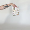 Video featuring our Small Wonders tea towel design. Accented with gold glitter, and printed on flour sack cotton. Designed by Katie Forte of June & December