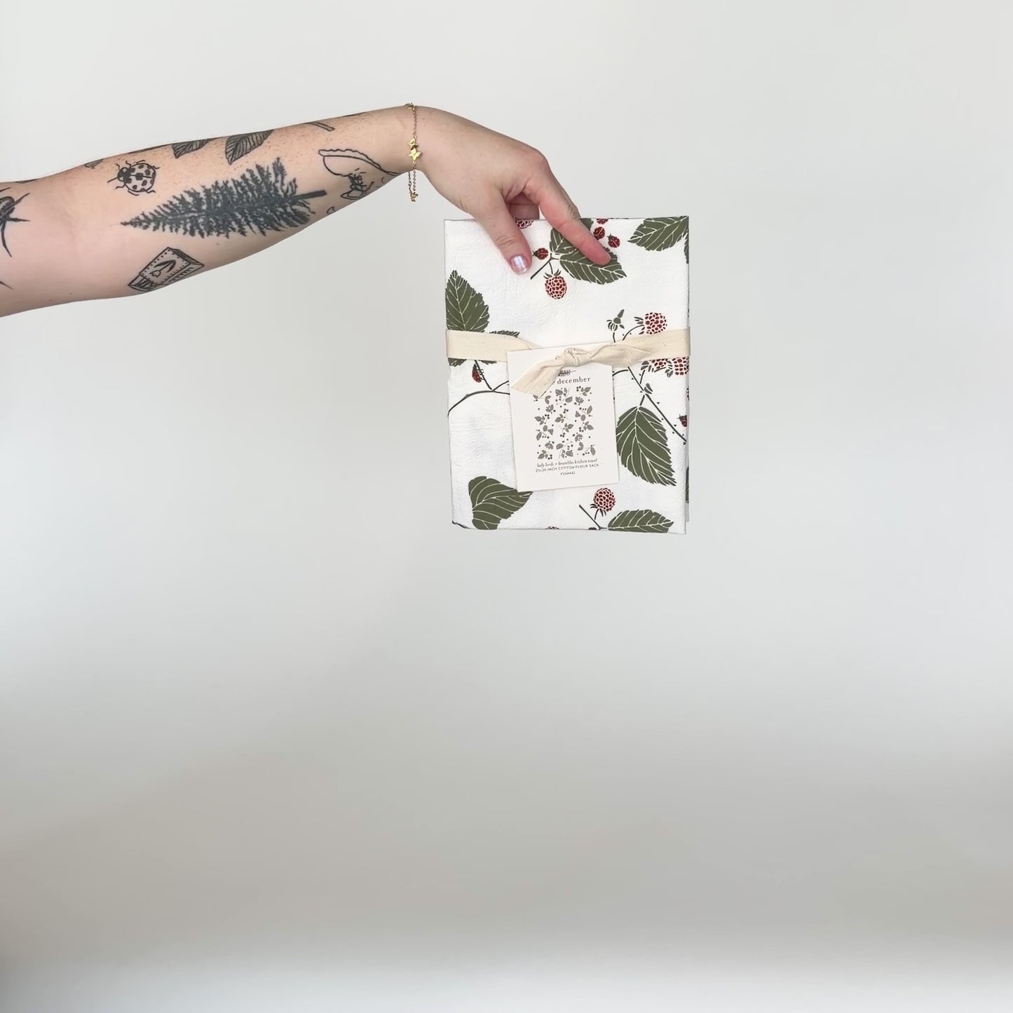 Load and play video in Gallery viewer, Video featuring our Lady Birds and Brambles tea towel design. Screen printed on flour sack cotton, a perfect gift year round. Designed by Katie Forte of June &amp;amp; December
