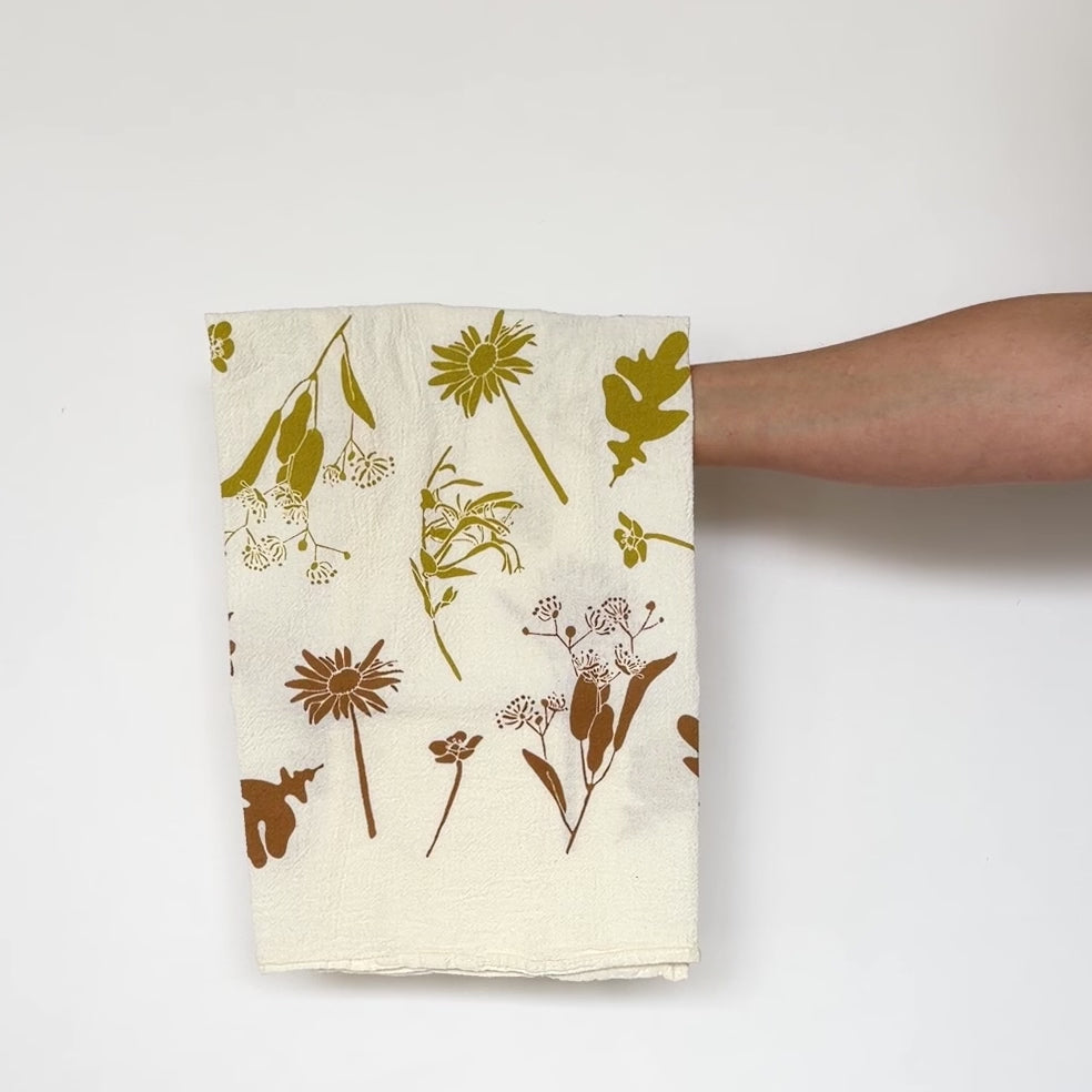 Load and play video in Gallery viewer, Video showing both sides of our Solstice tea towel design. Screen printed on flour sack cotton, a perfect gift for the whimsical nature lover. Designed by Katie Forte of June &amp;amp; December
