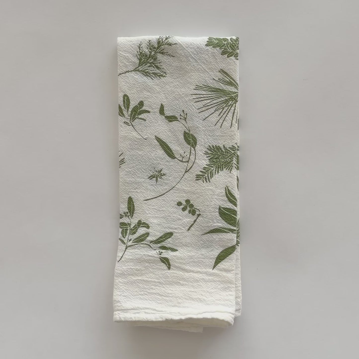 Video featuring eco-friendly cloth napkin printed with a Green Boughs and Berries design, designed by Katie Forte of June & December