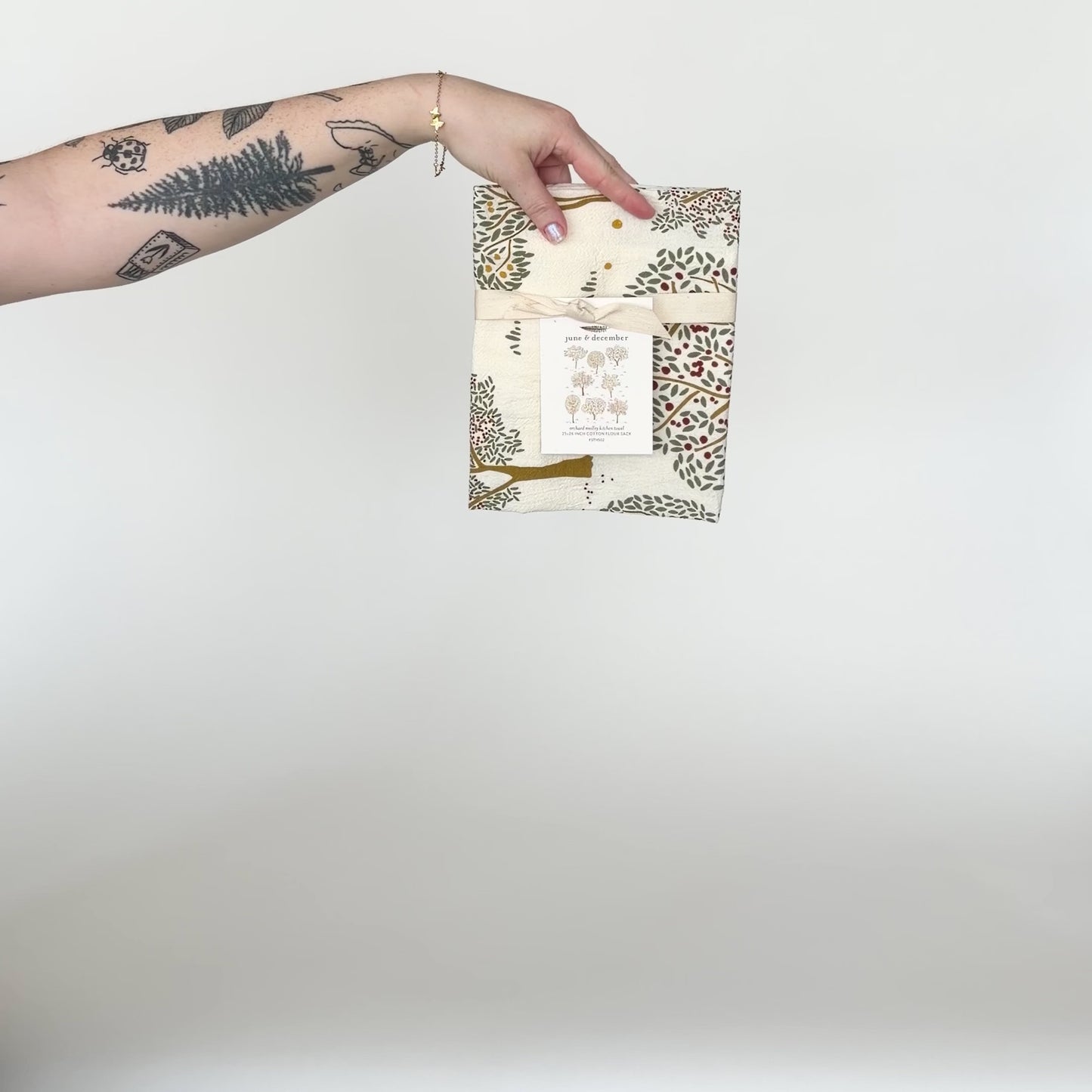 Load and play video in Gallery viewer, Video featuring our Orchard Medley tea towel design, printed on flour sack cotton. A perfect gift for a fall picnic in the orchard. Designed by Katie Forte of June &amp;amp; December
