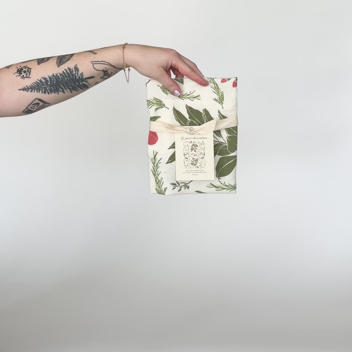 Load and play video in Gallery viewer, Video showing our Festive Flavors tea towel, made from flour sack cotton, perfect addition for holiday decor. Designed by Katie Forte of June &amp;amp; December
