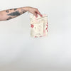 Video featuring our Poinsettia and Pine tea towel design, screen printed on flour sack cotton. Designed by Katie Forte of June & December
