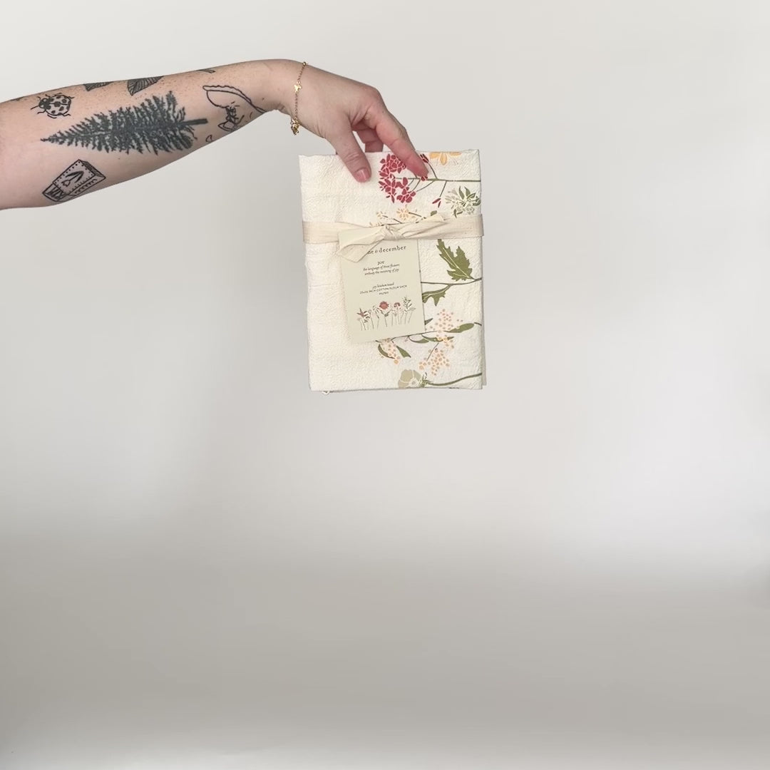 Load and play video in Gallery viewer, Video featuring our Language of Flowers, Joy, tea towel design. Printed on flour sack cotton, designed by Katie Forte of June &amp;amp; December
