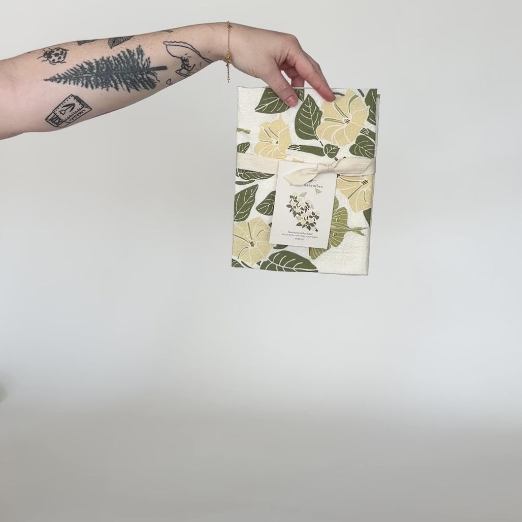 Video showing our Luna Moon tea towel design. Screen printed on flour sack cotton, featuring Luna Moths and Moon Flowers. Designed by Katie Forte of June & December