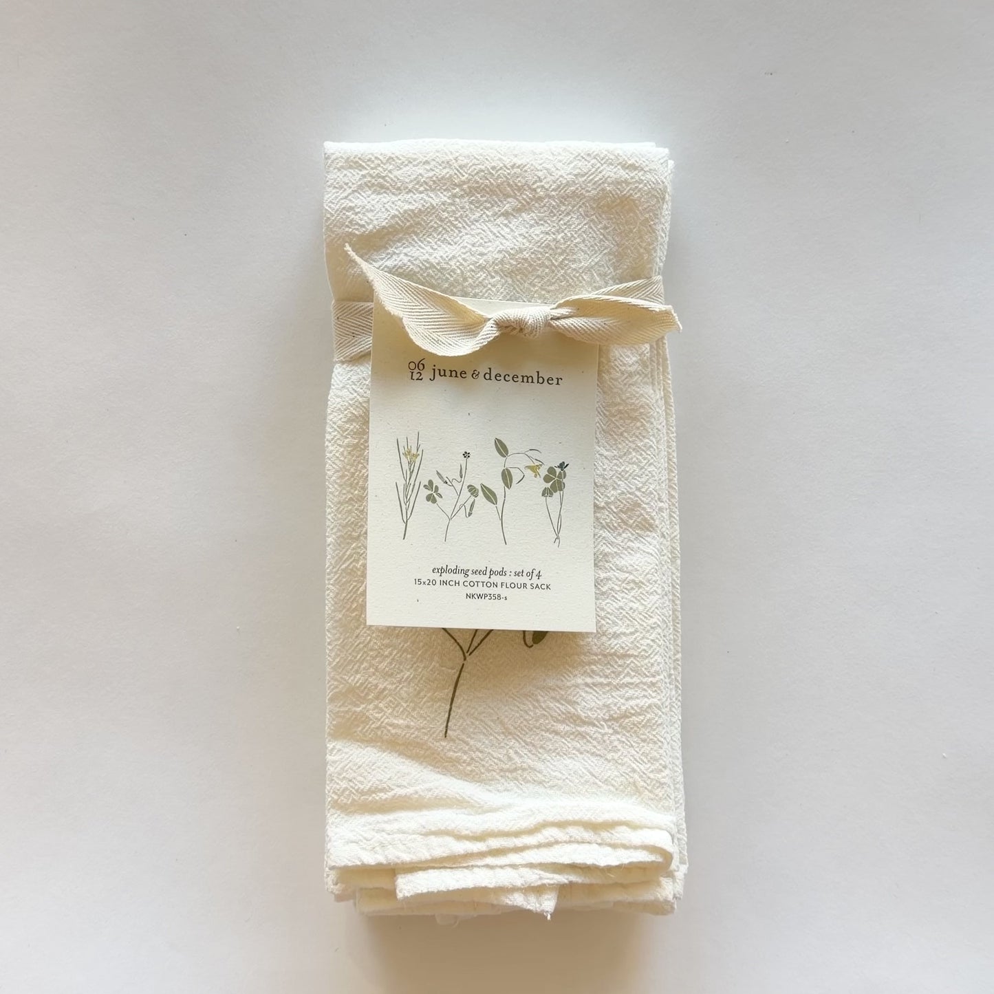 Load and play video in Gallery viewer, Video featuring our Exploding Seed Pods cloth napkin set, made from flour sack cotton, designed by Katie Forte of June &amp;amp; December

