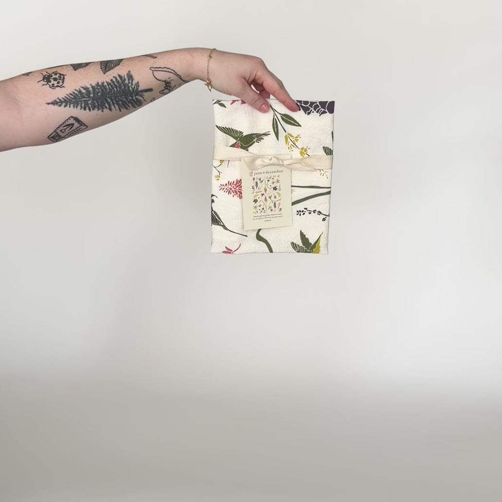 Load and play video in Gallery viewer, Video featuring our Hummingbird Garden tea towel design, screen printed on flour sack cotton. Designed by Katie Forte of June &amp;amp; December

