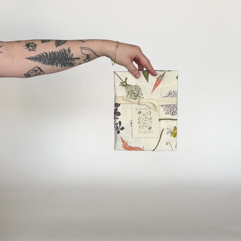 Load and play video in Gallery viewer, Video featuring our Flowering Veggies tea towel, made from flour sack cotton, and great gift for someone who like to tend to their garden. Designed by Katie Forte of June &amp;amp; December
