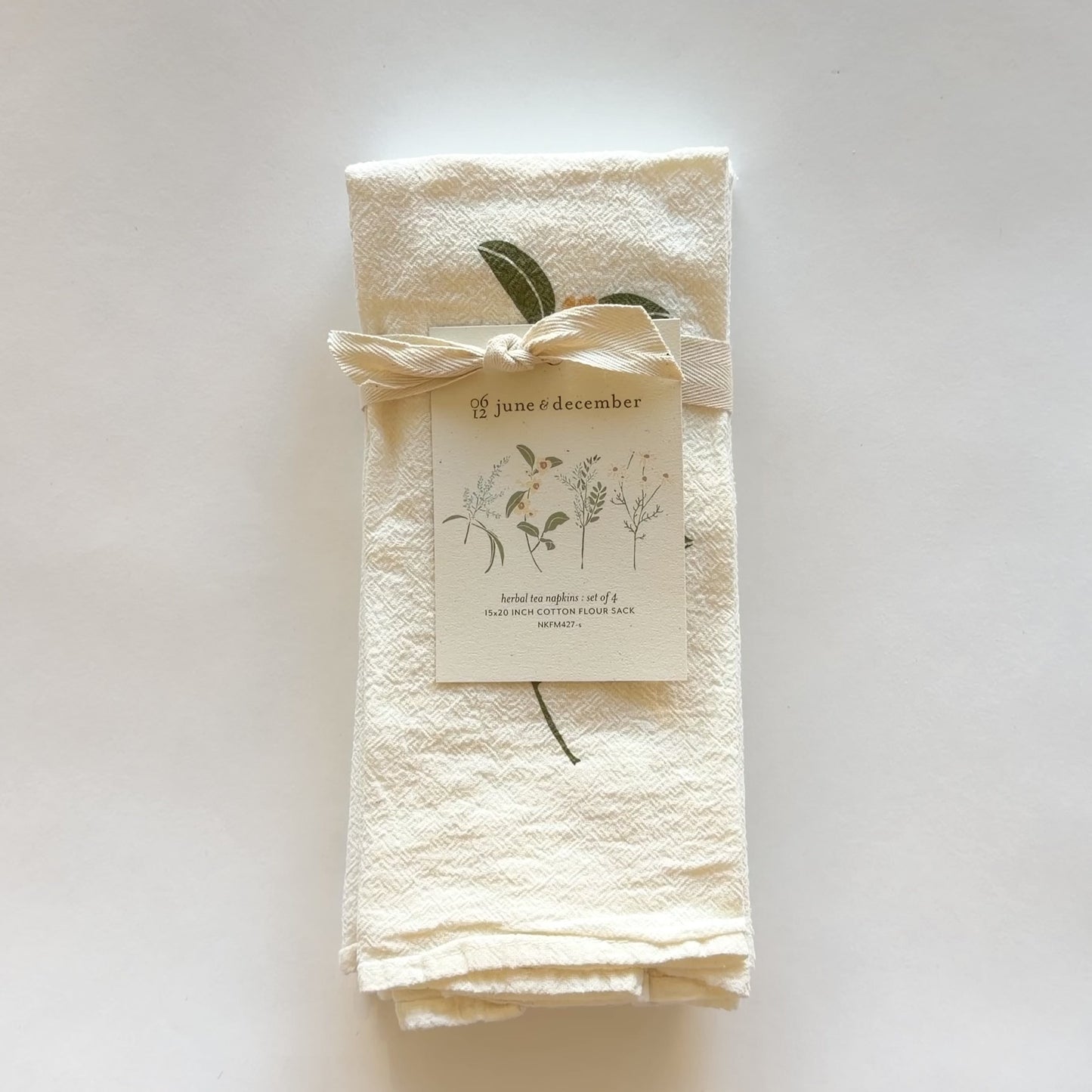 Load and play video in Gallery viewer, Video featuring our Herbal Tea Garden cloth napkin set, printed on an eco-friendly flour sack, designed by Katie Forte of June &amp;amp; December
