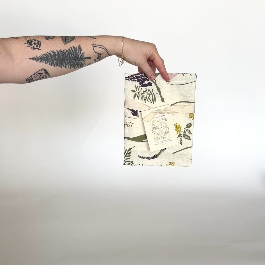 Load and play video in Gallery viewer, Video showing our packaged Found and Foraged tea towel design, made from flour sack cotton, designed by Katie Forte of June &amp;amp; December
