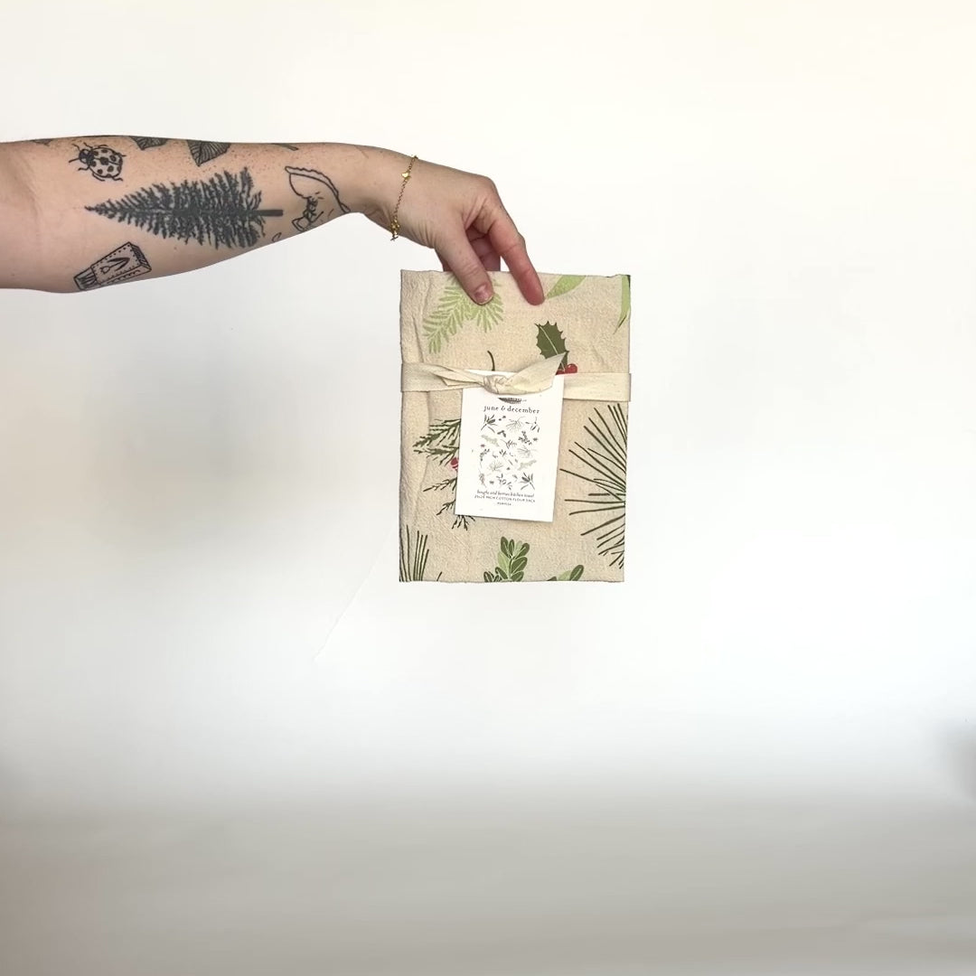 Video featuring our Boughs and Berries tea towel design in natural, made from flour sack cotton, perfect addition the the holiday decor. Designed by Katie Forte of June & December