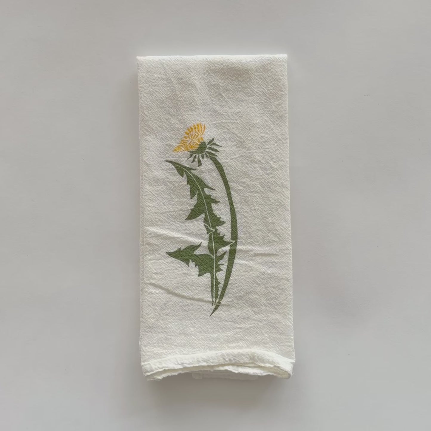 Load and play video in Gallery viewer, Video showing both side of our Dandelion and Clover design that&amp;#39;s screen printed on an eco-friendly cloth napkin, designed by Katie Forte of June &amp;amp; December
