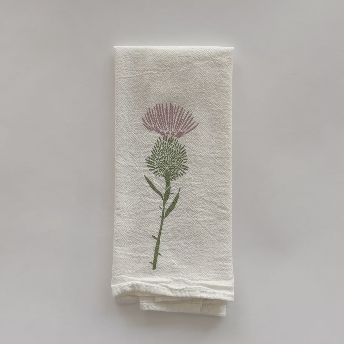 Load and play video in Gallery viewer, Video featuring our Thistle and Wild Onion design, screen printed on an eco-friendly flour sack cloth napkin, designed by Katie Forte of June &amp;amp; December
