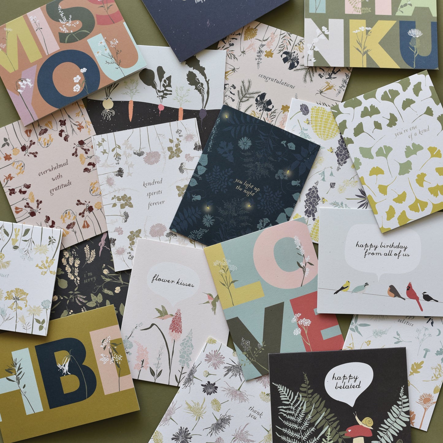 Eco-friendly card with various birds on a wire wishing you a happy birthday, designed by katie forte of june & december