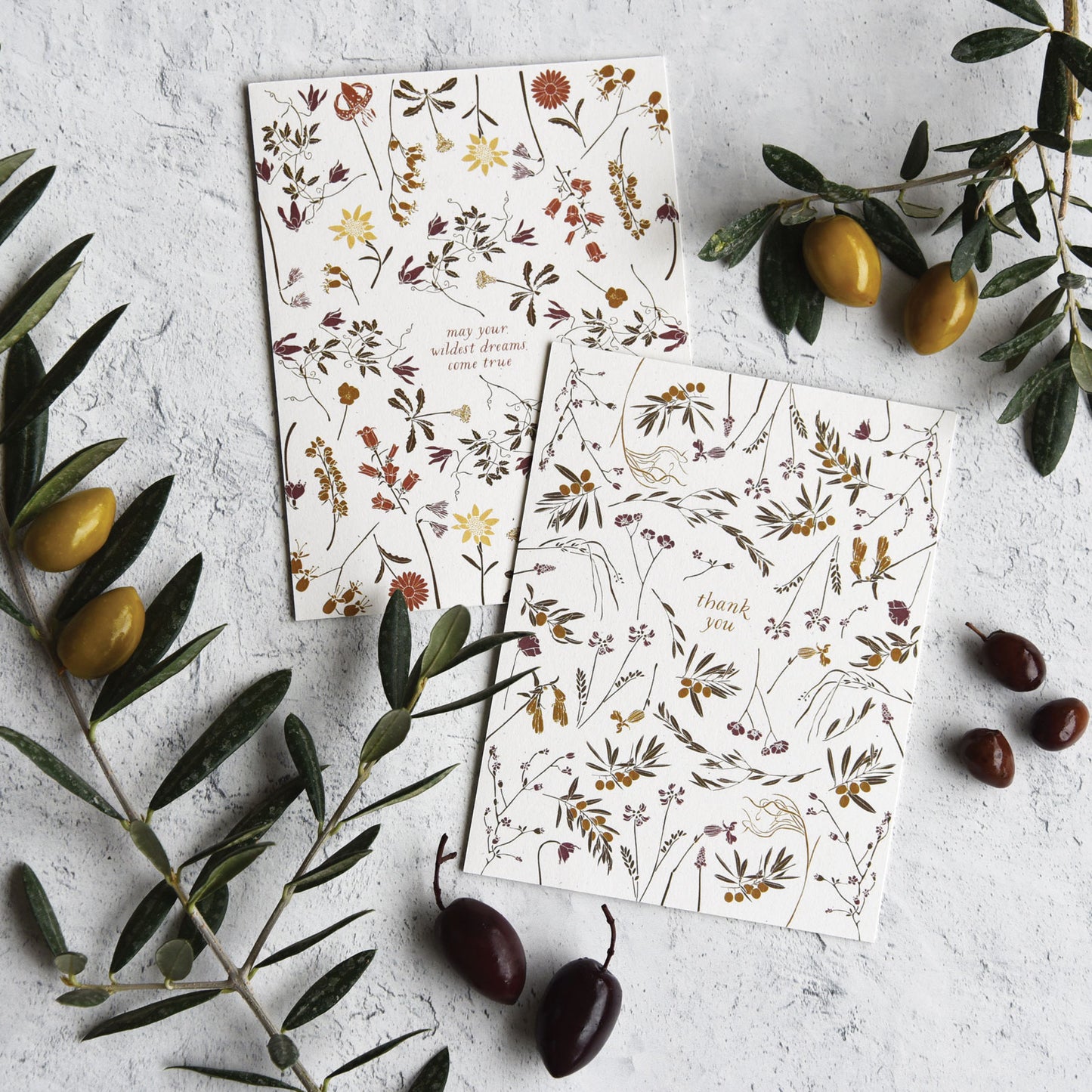 Sustainable greeting card with Olive design along side wildflowers, designed by katie forte of june & december