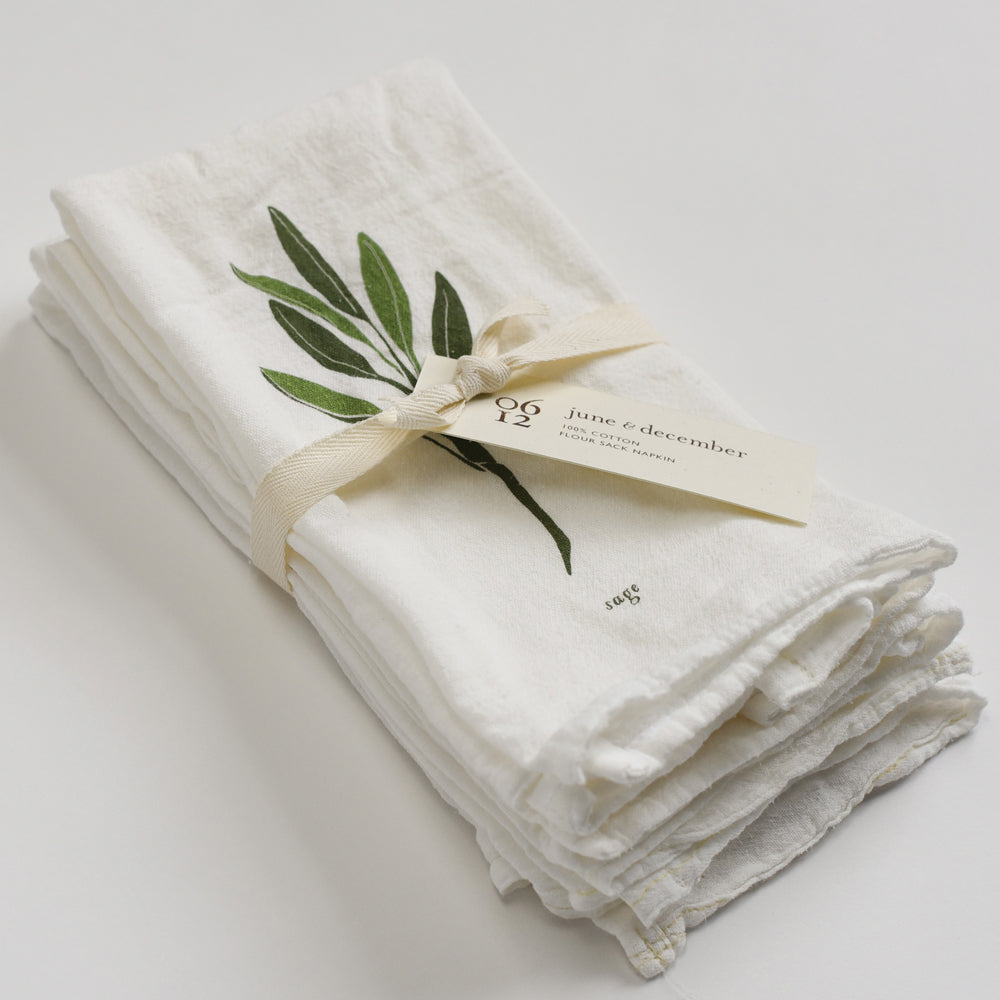 Cloth reusable dinner napkins made with eco-friendly flour sack in the USA, featuring botanical herb artwork by June & December artist Katie Forte